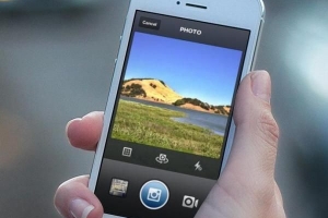Hur man postar om foton på instagram